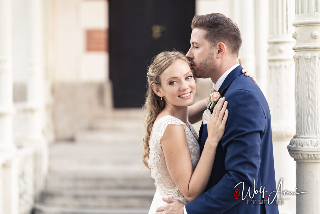 the primary camera setting to blur the background in a wedding portrait is aperture