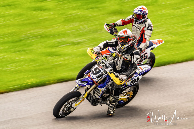 Motorsport photography two bikers photographed with long exposure